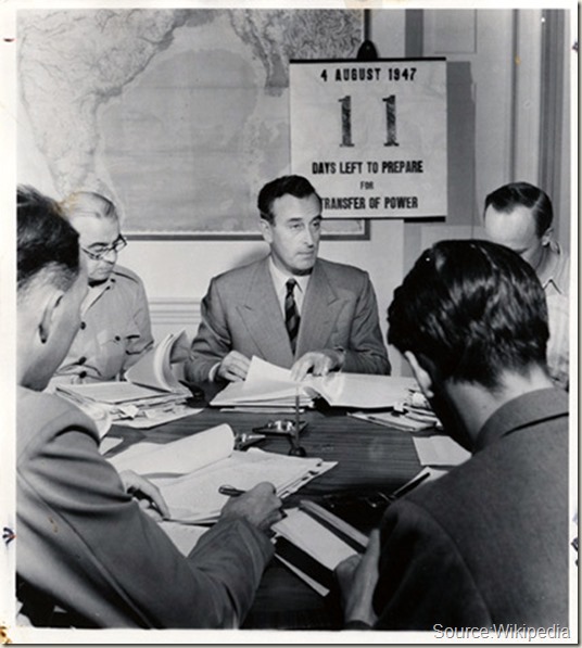 Eleven days before returning independence to India, Lord Mountbatten works with his advisors to divide India peaceably. New Delhi, India, August 4th, 1947. (David Douglas Duncan)